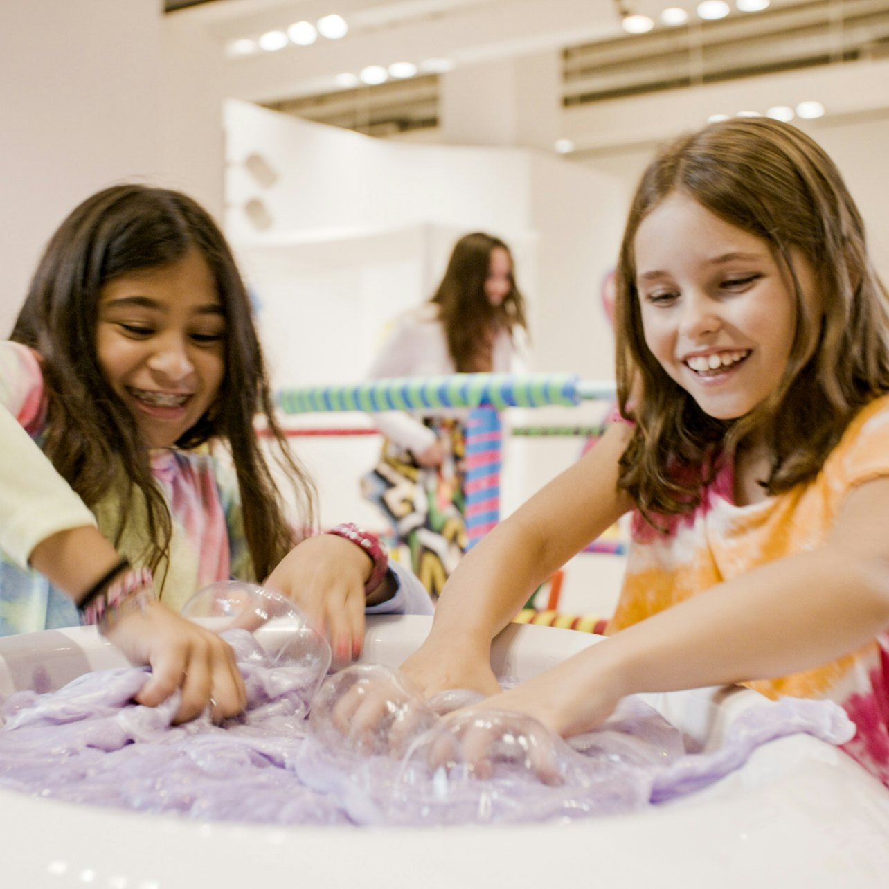 Explore a playful world of slime scents and textures at Sloomoo Experience perfect for engaging the senses and creating lasting memories with friends and family. Enjoy crafting your own slime masterpiece!